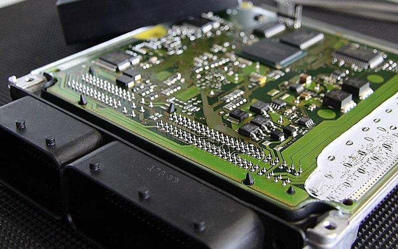 Engine control unit circuit board taken out of its housing
