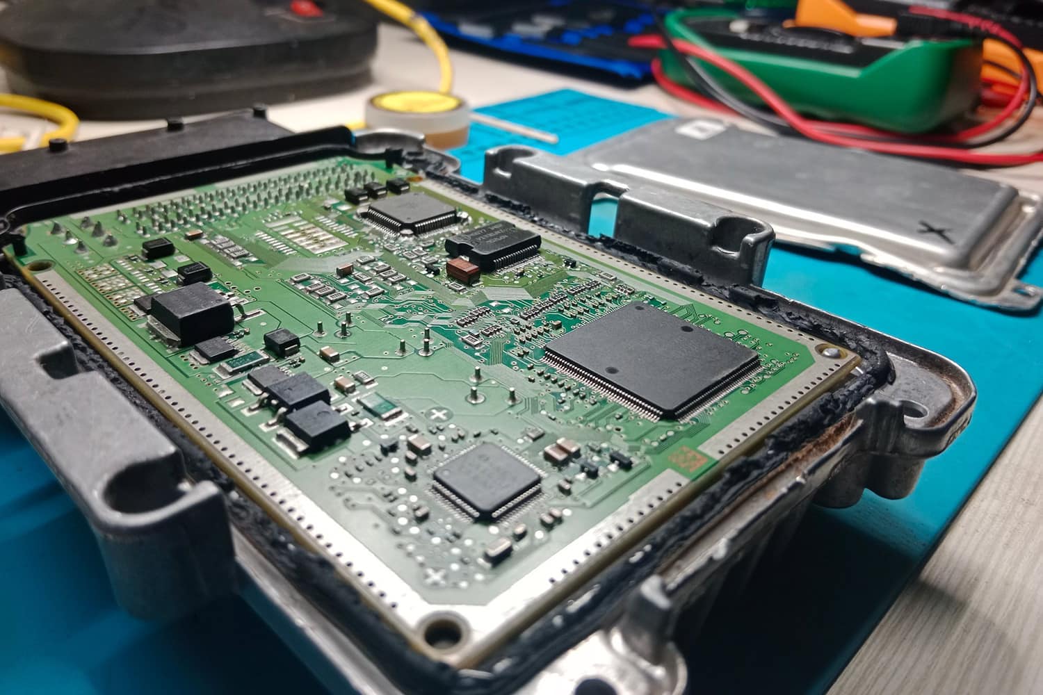 Engine control module being checked on a workshop bench
