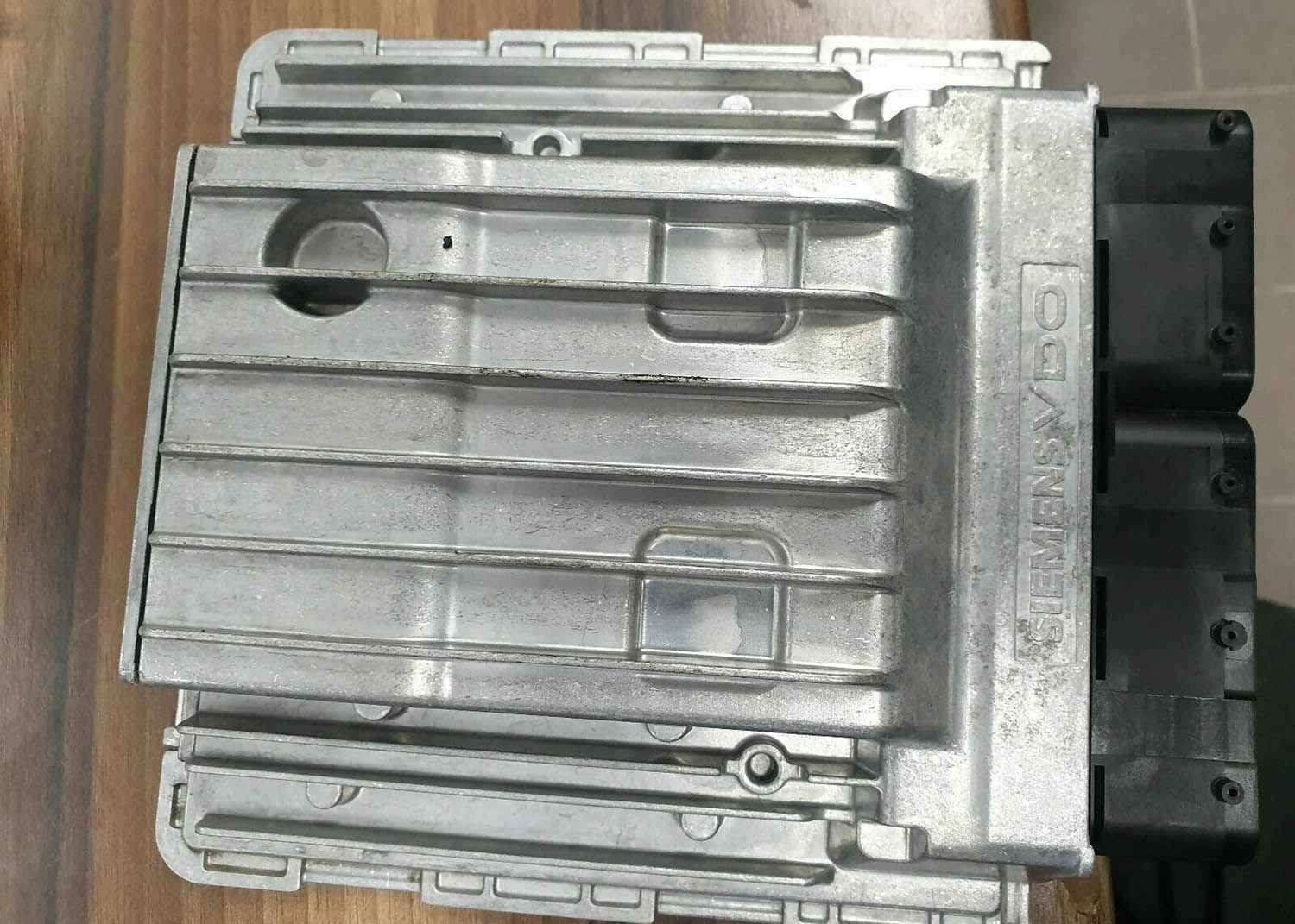 Engine control module removed from the car for repair