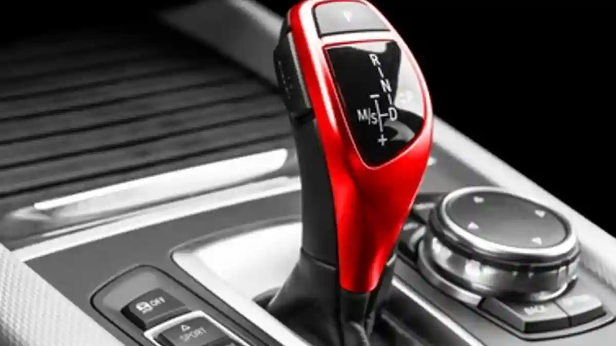 Automatic gear selector lever in a car centre console