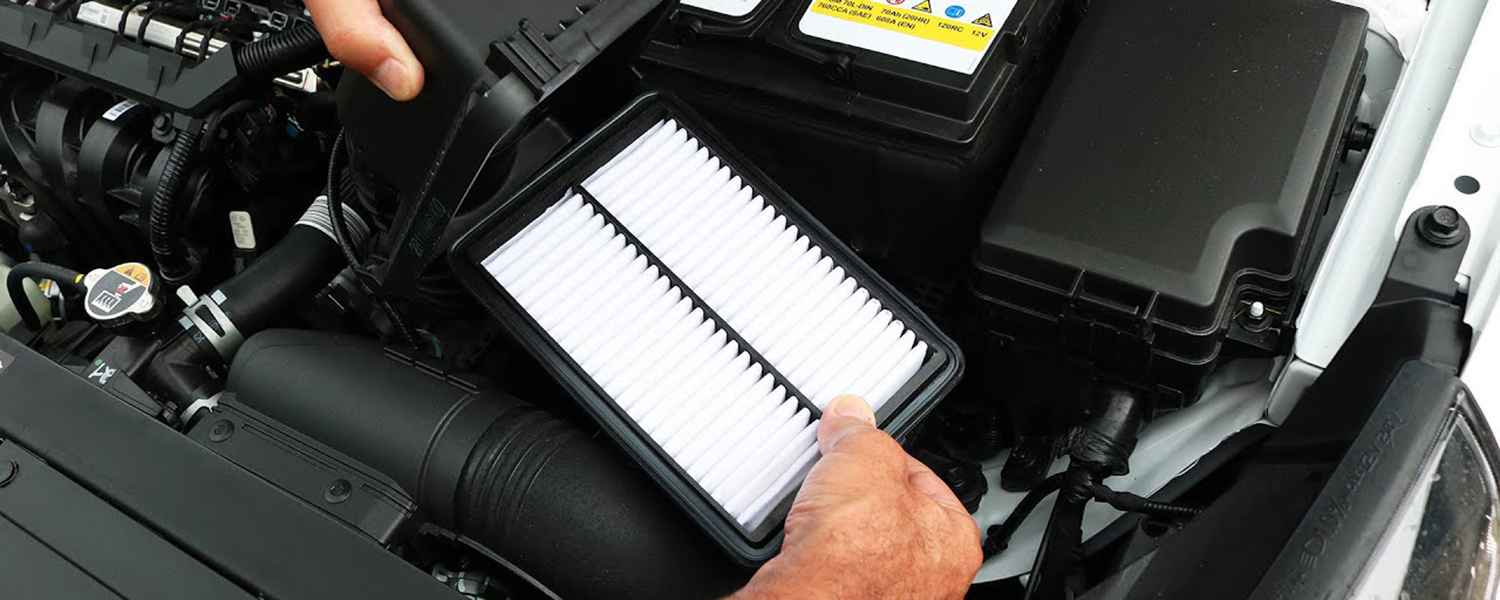 Replacement engine air filter being positioned in its housing