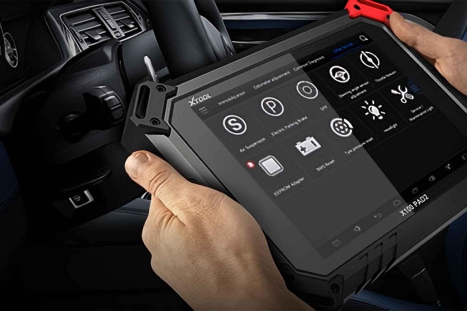 Vehicle diagnostic equipment being used inside a car