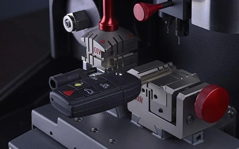 Car key blade held in a precision cutting machine