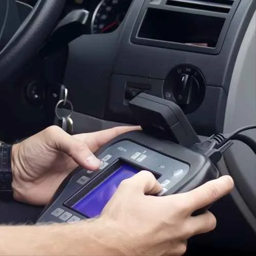 Diagnostic key programming tool inside a car