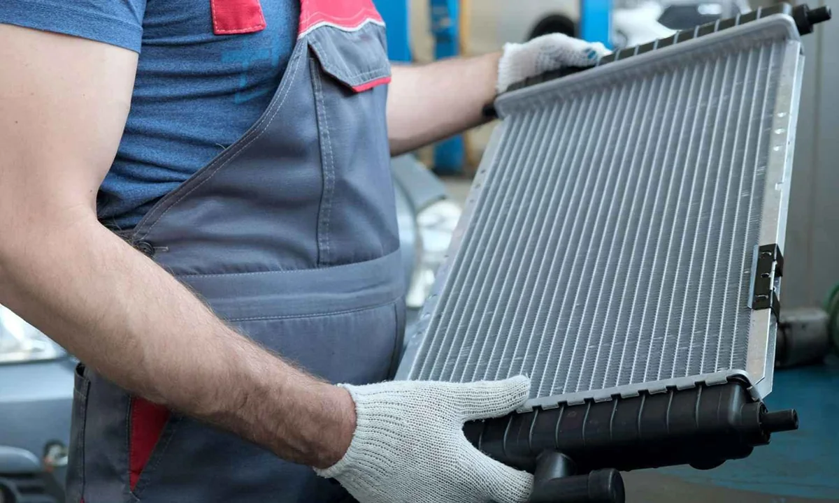 A car radiator with its cooling fins and end tanks