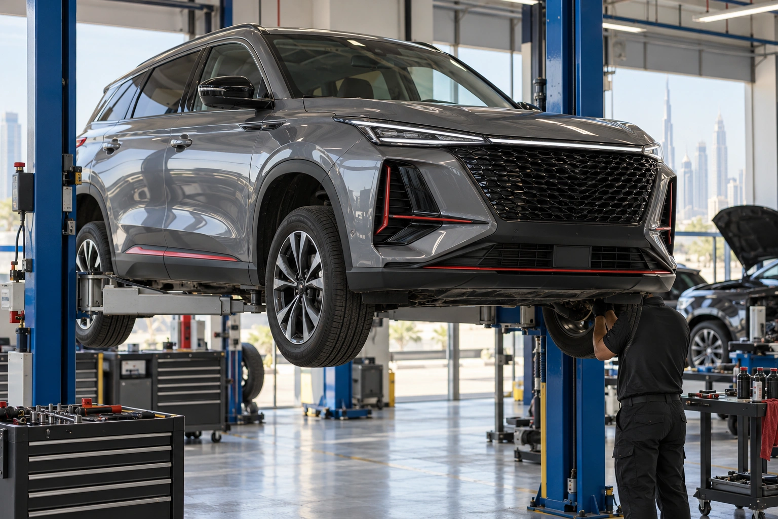 Grey CS75 Plus on a two post workshop lift