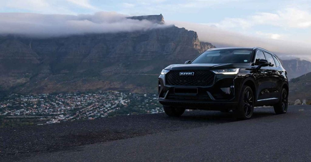 A diesel car cruising along a winding road