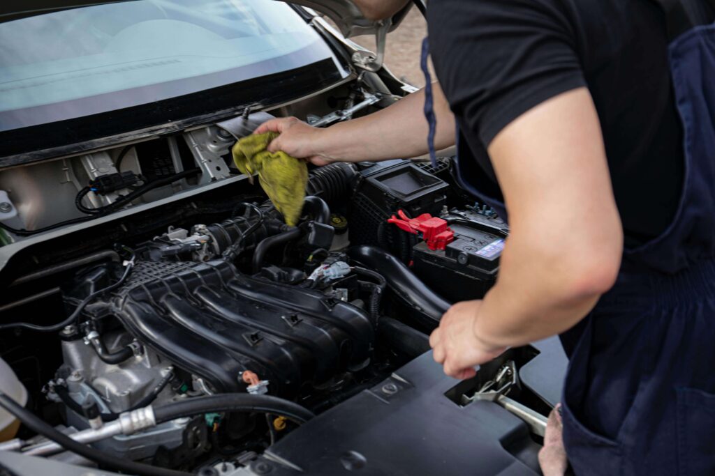 Car being checked for it's starting issues in workshop.