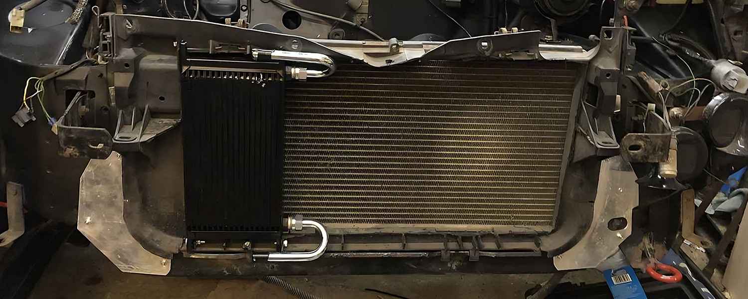 Front cooling pack exposed with the vehicle bumper removed